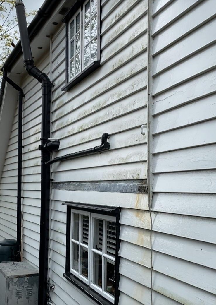 Soft washing exterior wall work